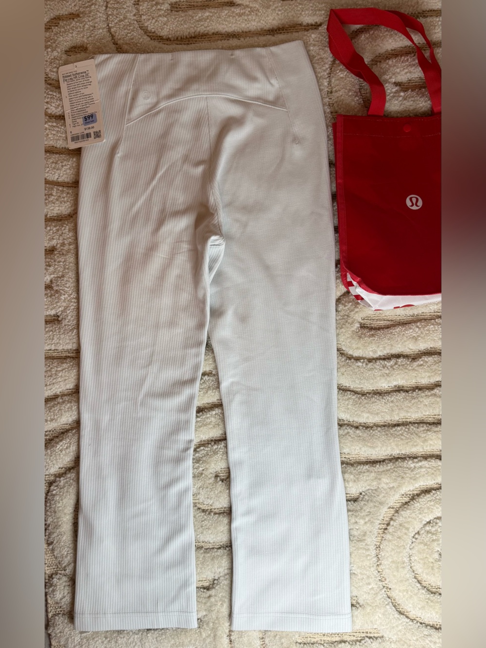 Lululemon Ribbed Softstreme Zip-Leg
High-Rise Cropped Pants 25 inch
Bone White